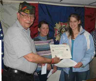 Picture of 1st Place winner accepting prize